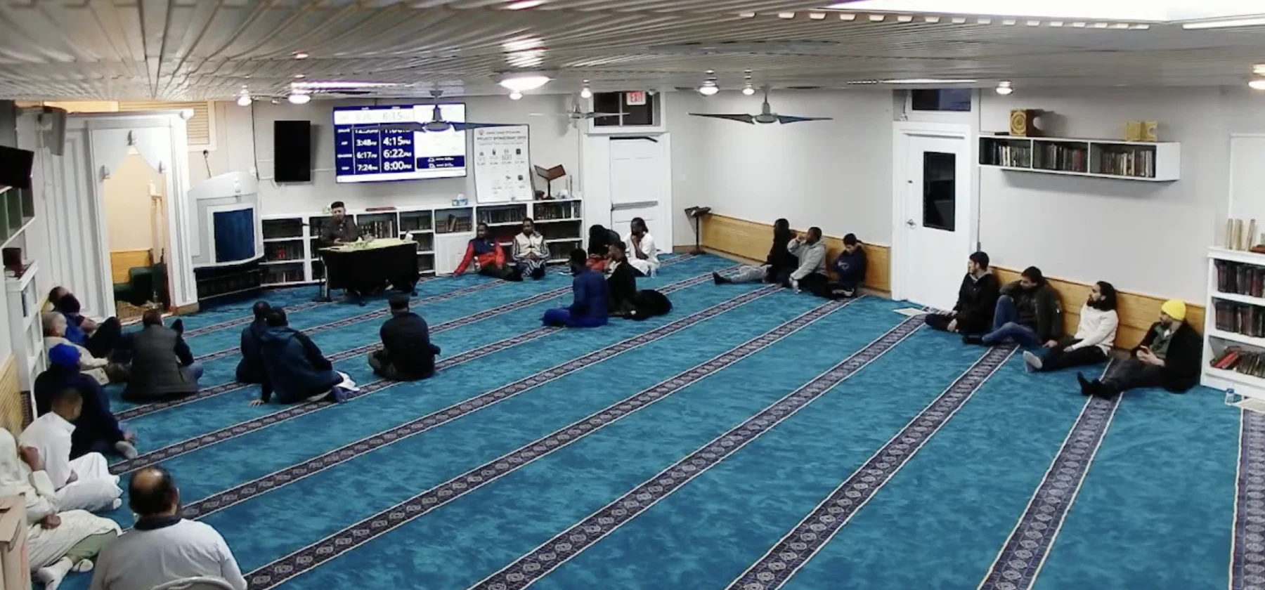 Community members attending a lecture at ICC